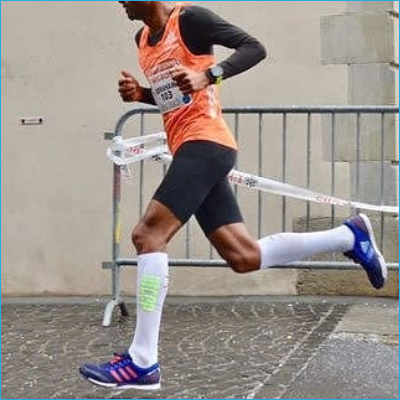 Tadesse Abraham mit CEP ultralight Socks in weiss